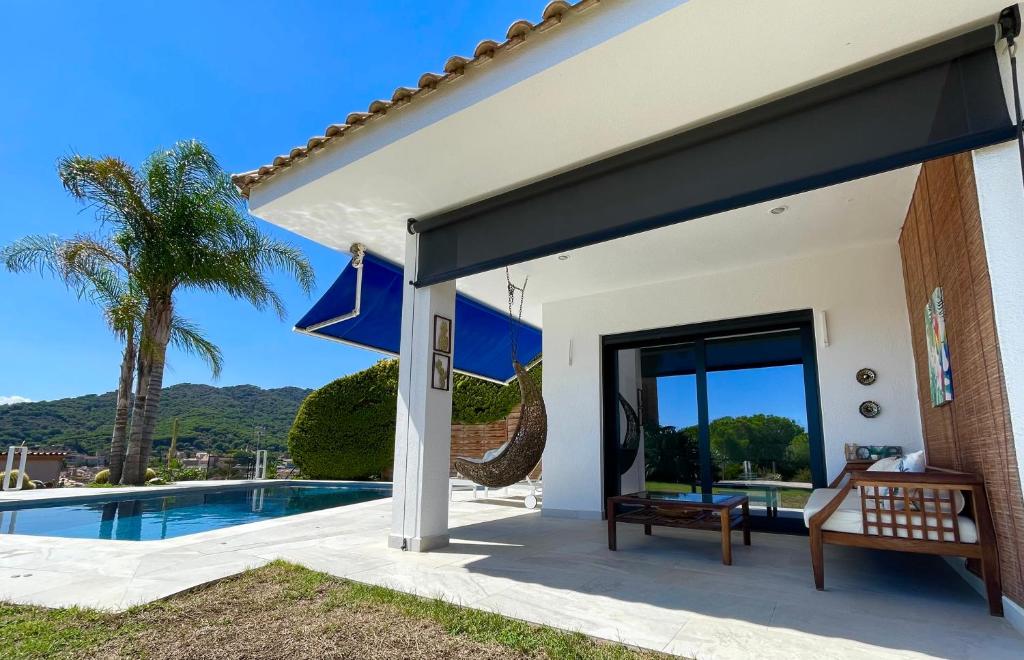 Patio with hammock and pool
